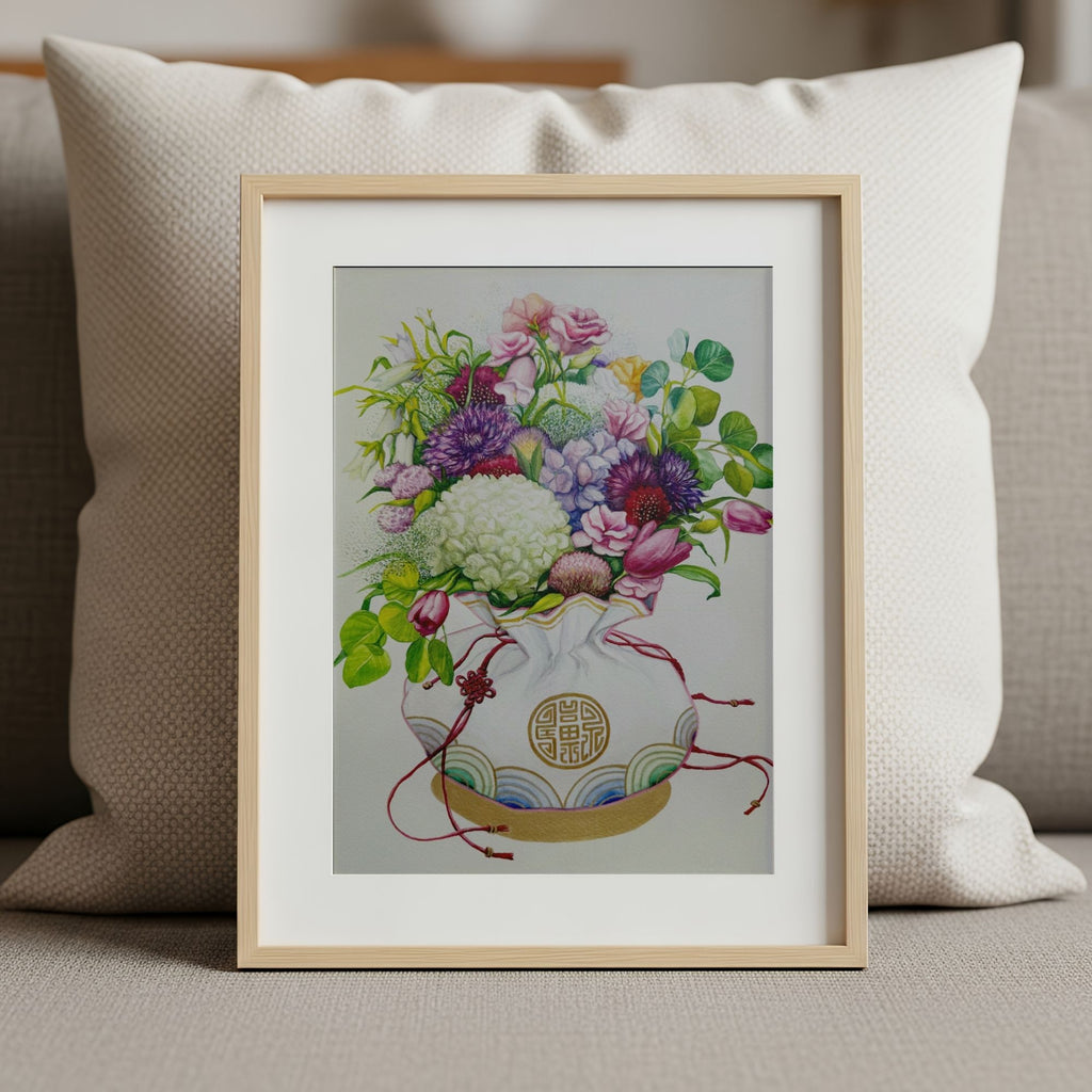 Framed art print of a Korean coin pouch with a bouquet of flowers, which symbolizes celebrates luck, good health, and fortune, leaning against a textured pillow.