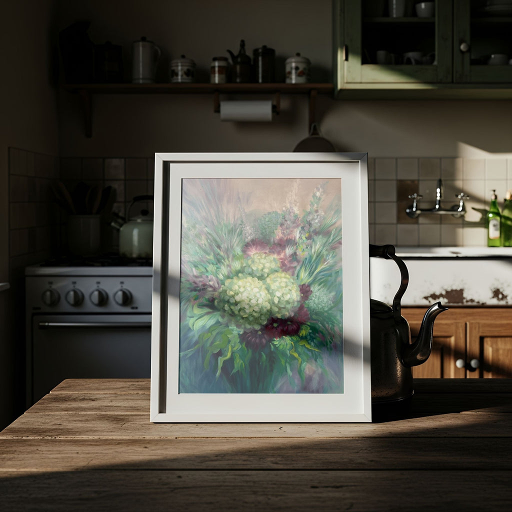 Framed floral print on a wooden table in a kitchen setting.