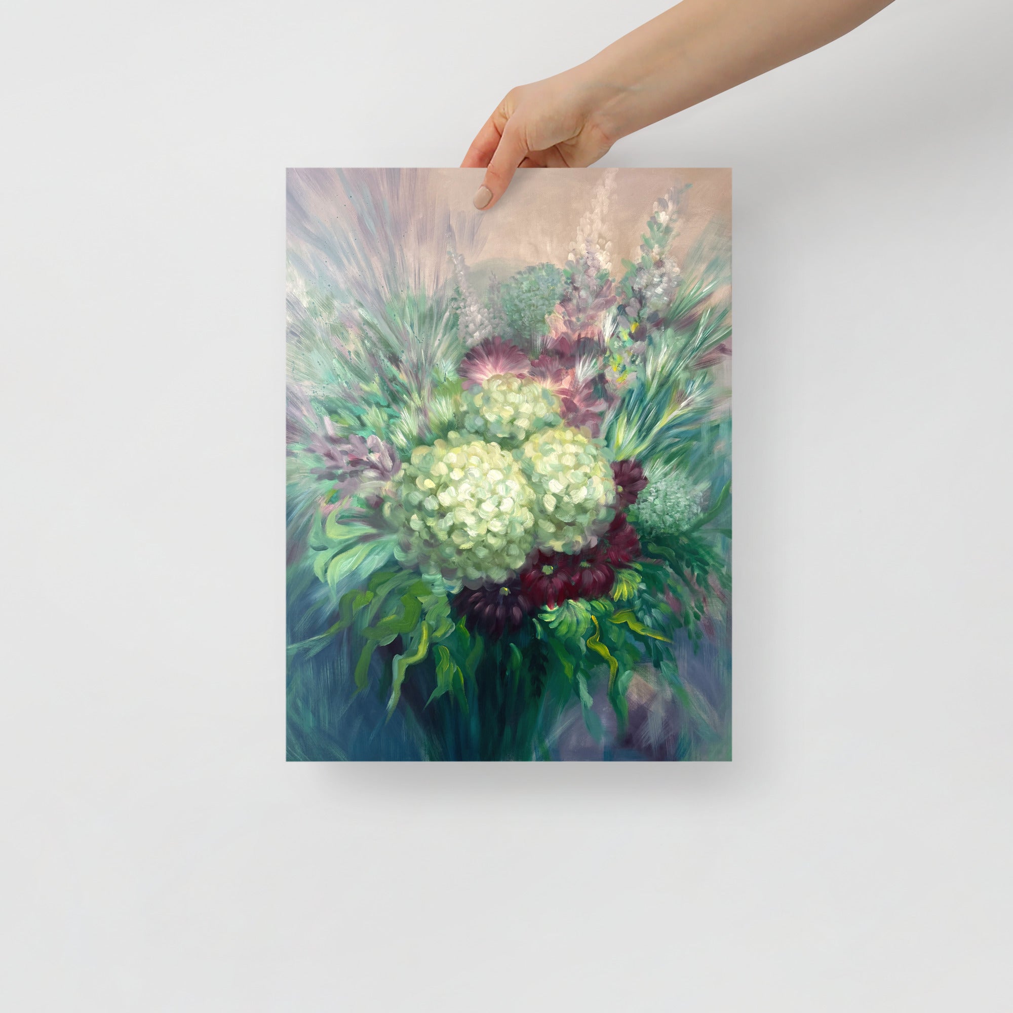 Hand holding a 12x16 inch floral art print on a white background.
