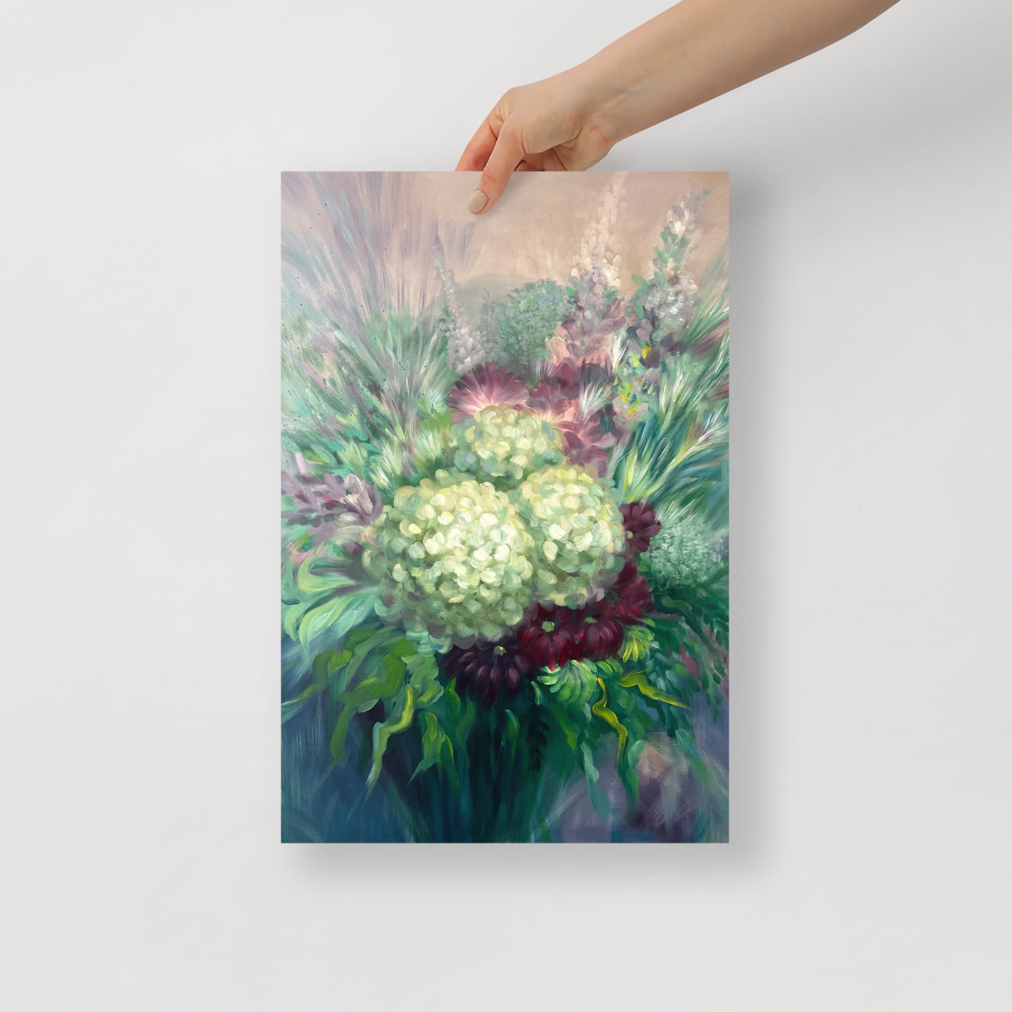 Hand holding a 12x18 inch floral art print on a white background.