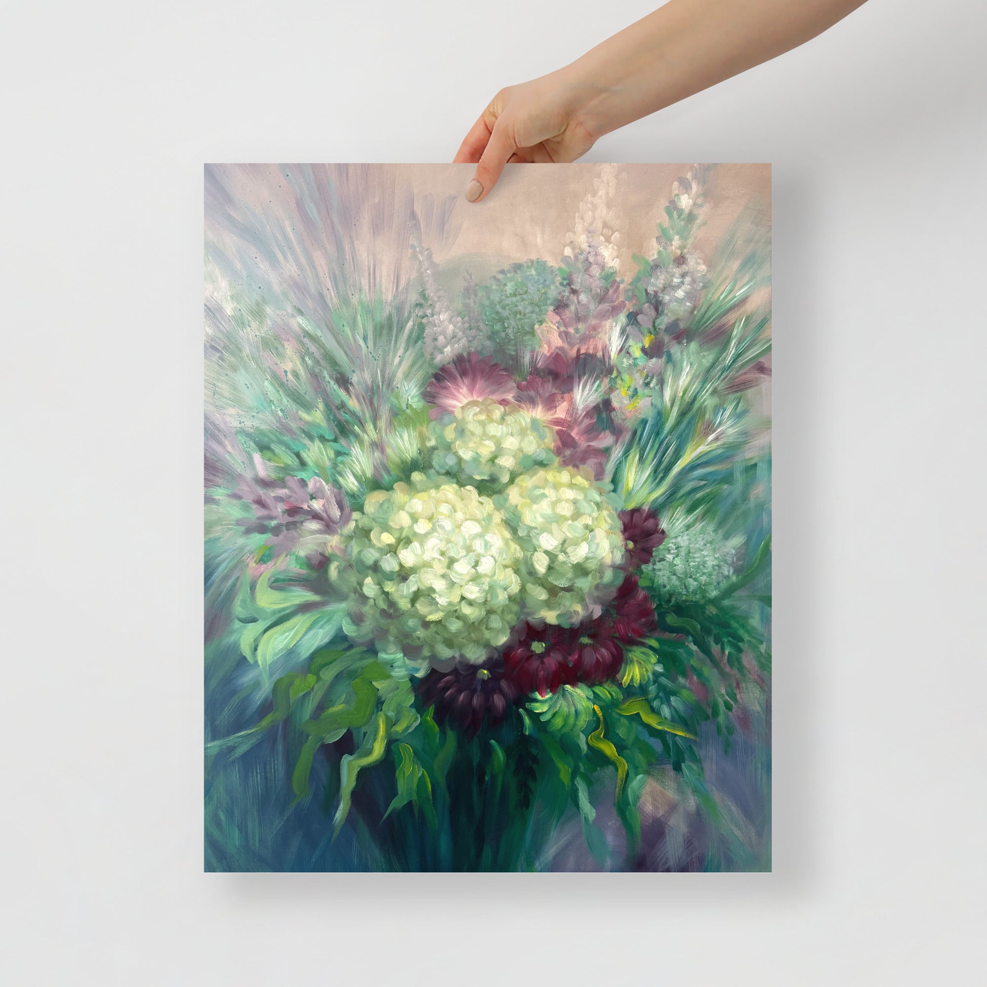 Hand holding a 16x20 inch floral art print on a white background.