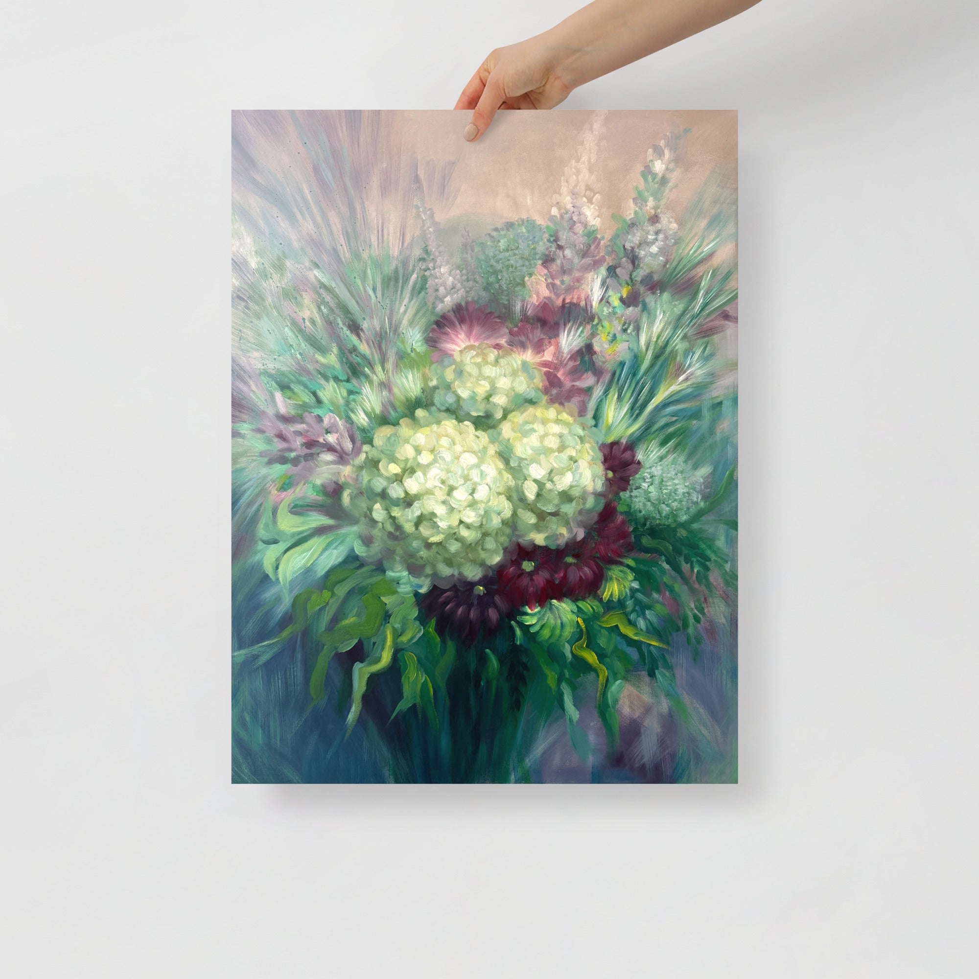 Hand holding a 18x24 inch floral art print on a white background.