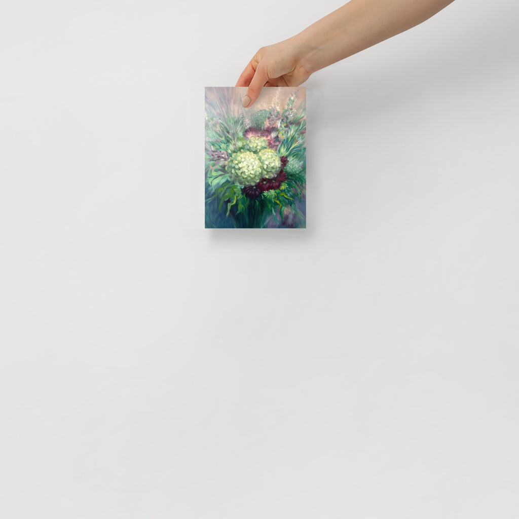 Hand holding a 5x7 inch floral art print on a white background.